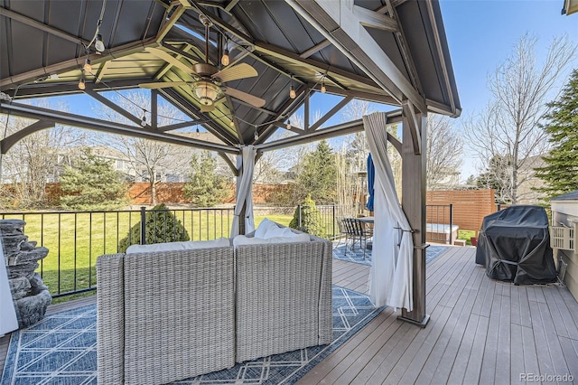 7378 Geode Ct, Castle Rock, CO 80108 - deck featuring a gazebo, ceiling fan, an outdoor hangout area, and outdoor dining space