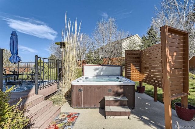 7378 Geode Ct, Castle Rock, CO 80108 - view of patio / terrace featuring a hot tub and a wooden deck
