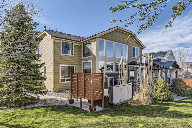 7378 Geode Ct, Castle Rock, CO 80108 - rear view of house with a lawn