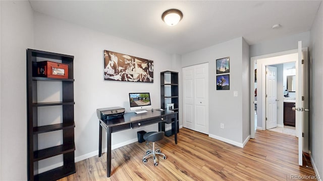 10759 Clermont St, Thornton, CO 80233 - office area with light wood-style flooring and baseboards
