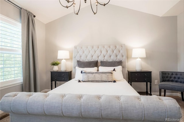8427 E 35th Ave, Denver, CO 80238 - bedroom featuring lofted ceiling, a chandelier, and baseboards