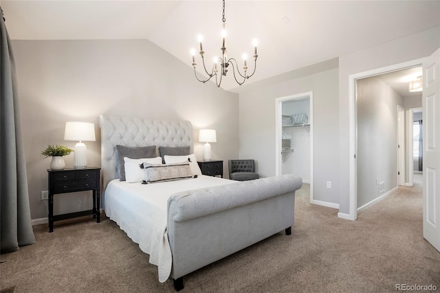 8427 E 35th Ave, Denver, CO 80238 - carpeted bedroom featuring a chandelier, a walk in closet, lofted ceiling, baseboards, and a closet
