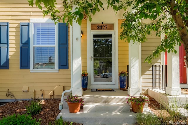 8427 E 35th Ave, Denver, CO 80238 - view of exterior entry featuring covered porch