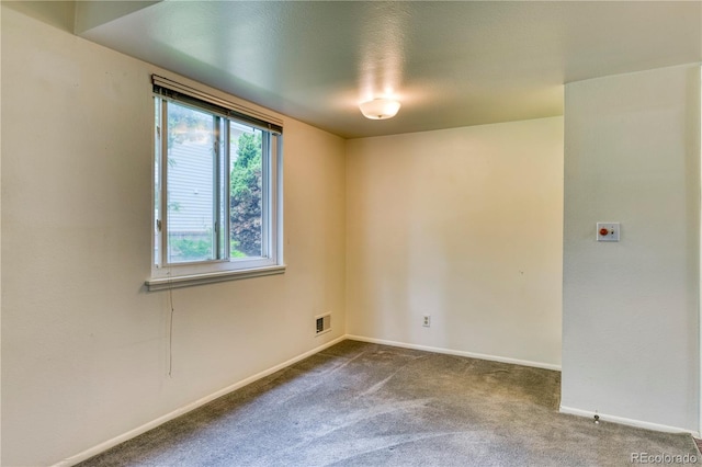 3351 S Field St Unit 191, Lakewood, CO 80227 - spare room with dark colored carpet and baseboards