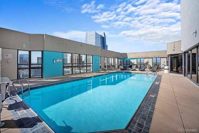 1625 Larimer St Unit 3004, Denver, CO 80202 - community pool featuring a patio