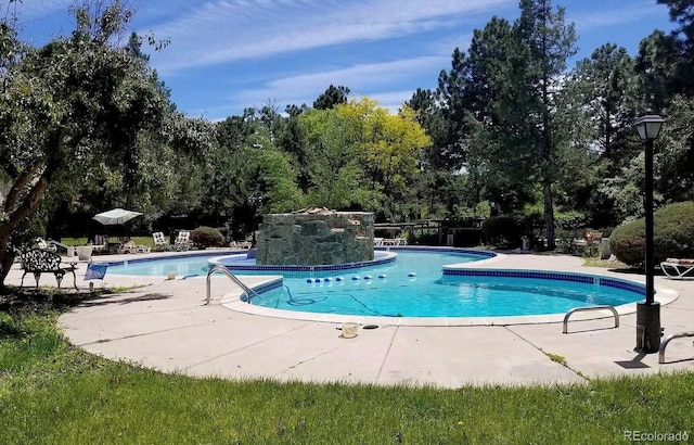 pool featuring a patio area