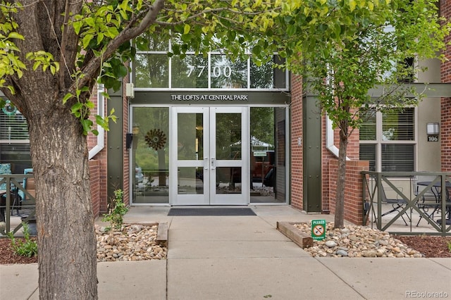 7700 E 29th Ave Unit 102, Denver, CO 80238 - entrance to property with french doors and brick siding