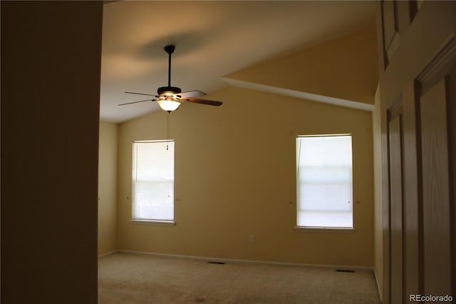 213 Mesa St, Brighton, CO 80601 - spare room featuring carpet flooring, vaulted ceiling, ceiling fan, and baseboards