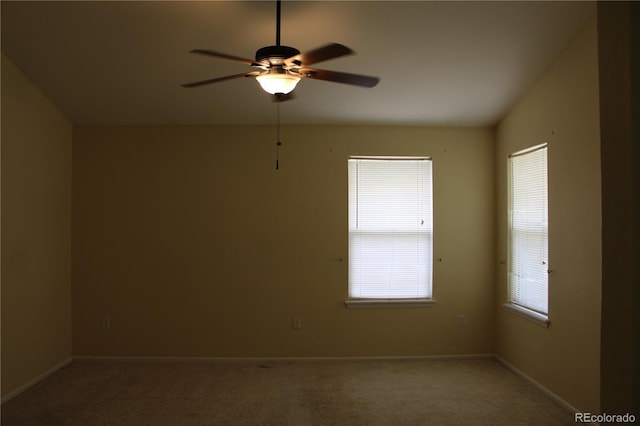 213 Mesa St, Brighton, CO 80601 - unfurnished room with healthy amount of natural light, a ceiling fan, and carpet flooring