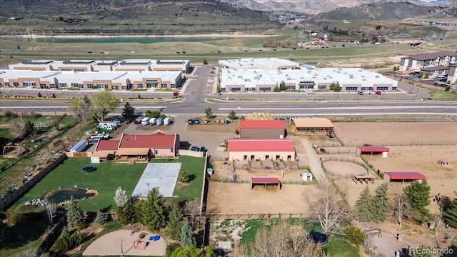 drone / aerial view featuring a mountain view