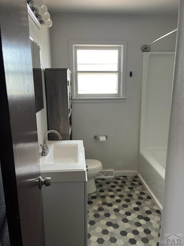 full bathroom with vanity, toilet, and shower / bath combination