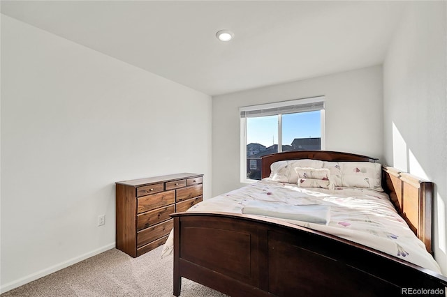 bedroom with light carpet