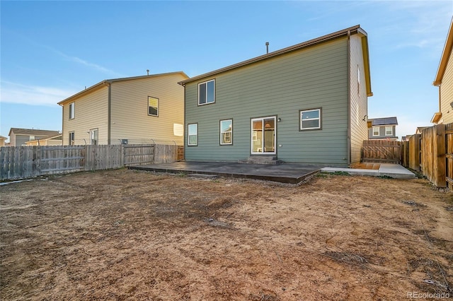 back of house featuring a patio