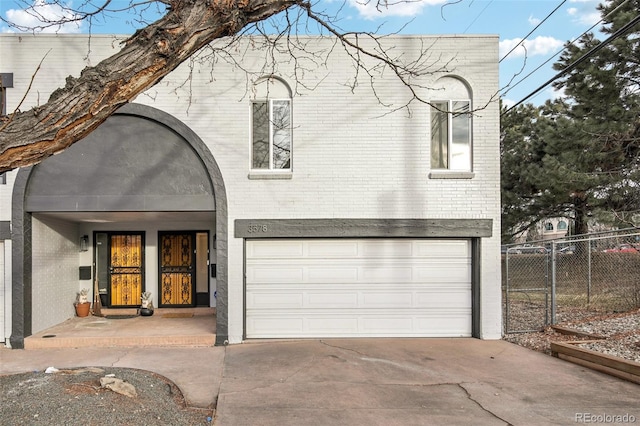 view of front of property featuring a garage