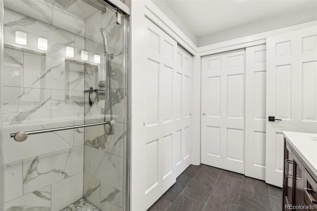 bathroom with vanity and an enclosed shower