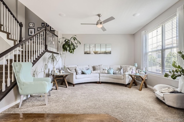 10811 Chambers Way, Commerce City, CO 80022 - living room with stairway, ceiling fan, and baseboards