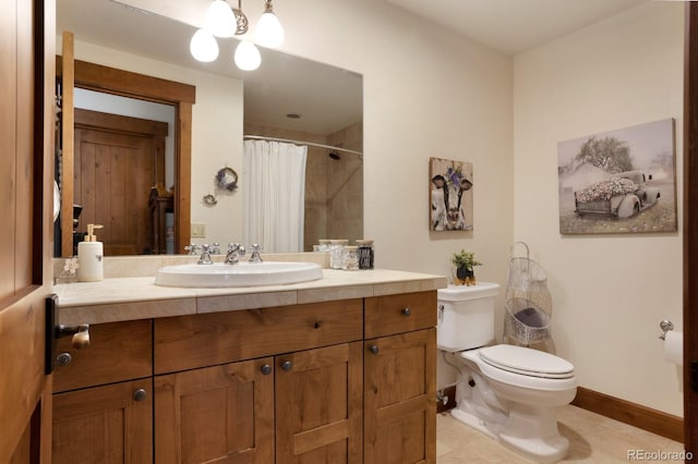 full bath with baseboards, toilet, a shower with shower curtain, and vanity