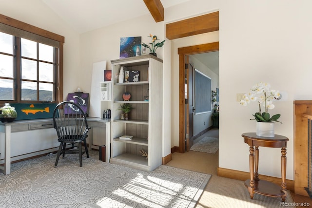 bedroom featuring carpet flooring, lofted ceiling with beams, and baseboards