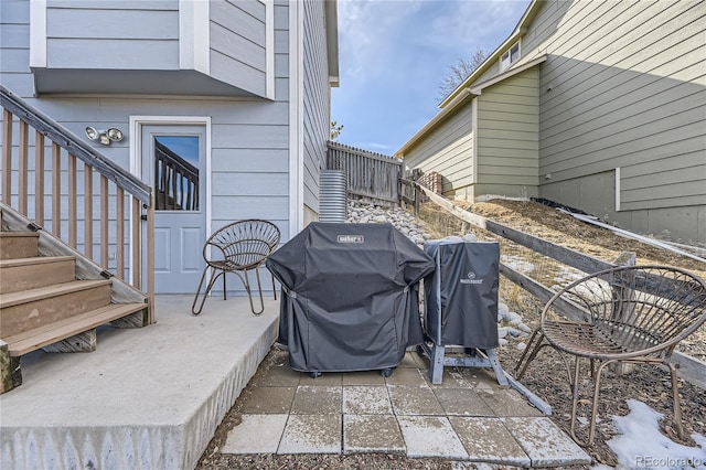 view of patio / terrace featuring area for grilling and fence