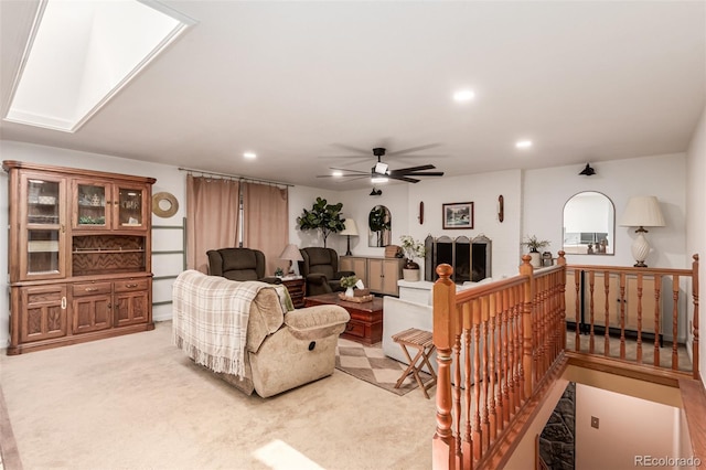 9861 Pecos St, Thornton, CO 80260 - living room with recessed lighting, a ceiling fan, light carpet, and a skylight