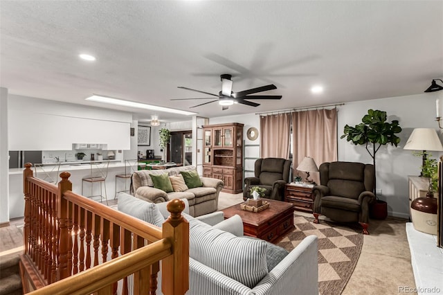 9861 Pecos St, Thornton, CO 80260 - living area with a ceiling fan, recessed lighting, and light carpet