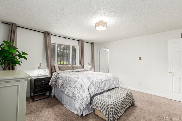 9861 Pecos St, Thornton, CO 80260 - bedroom with light colored carpet and a textured ceiling