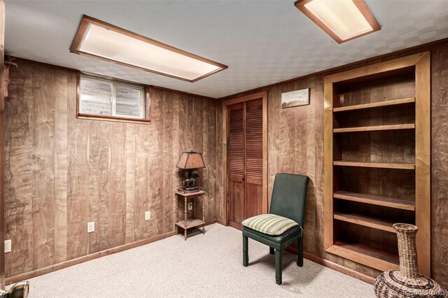 9861 Pecos St, Thornton, CO 80260 - sitting room featuring wood walls and carpet flooring