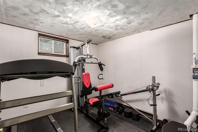 9861 Pecos St, Thornton, CO 80260 - exercise area featuring a textured ceiling