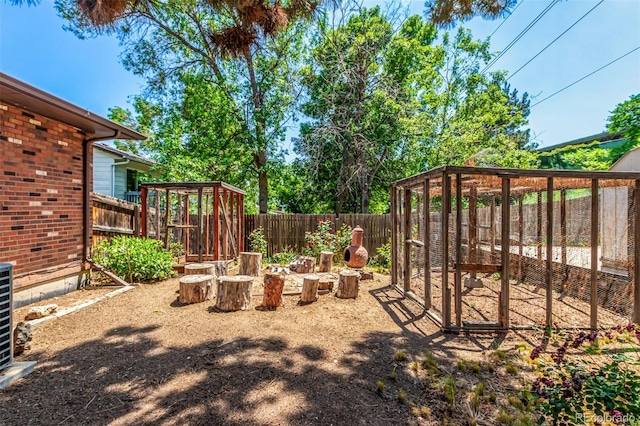 9861 Pecos St, Thornton, CO 80260 - fenced backyard featuring exterior structure