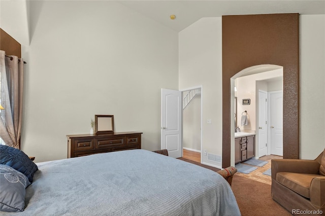 4737 E 127th Ave, Thornton, CO 80241 - bedroom with high vaulted ceiling and arched walkways
