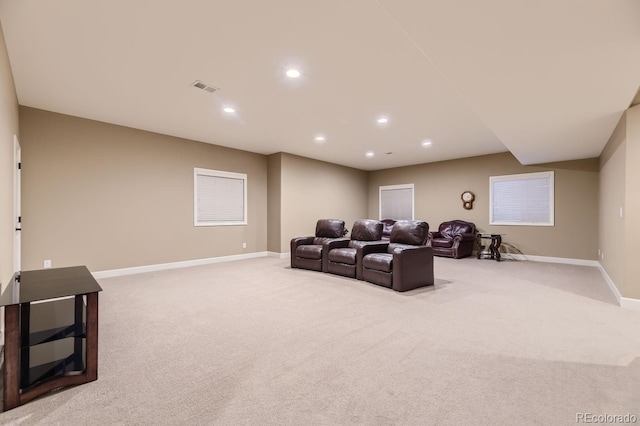 carpeted home theater room featuring recessed lighting, visible vents, and baseboards