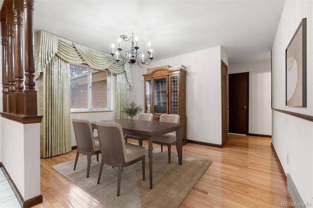 2696 S Yukon Ct, Lakewood, CO 80227 - dining space with a chandelier and light wood-type flooring