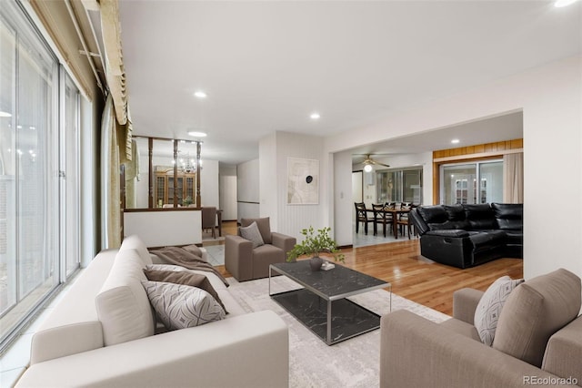 2696 S Yukon Ct, Lakewood, CO 80227 - living room featuring wood finished floors and recessed lighting
