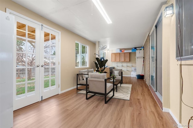 2696 S Yukon Ct, Lakewood, CO 80227 - living room featuring light wood-style floors and baseboards