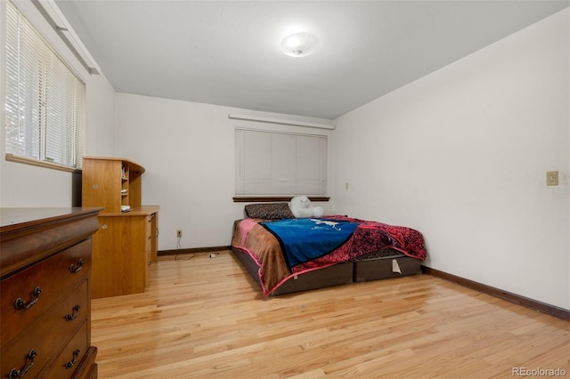2696 S Yukon Ct, Lakewood, CO 80227 - bedroom featuring light wood finished floors