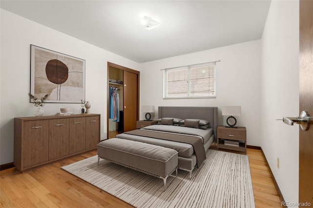 2696 S Yukon Ct, Lakewood, CO 80227 - bedroom featuring light wood-type flooring and a closet
