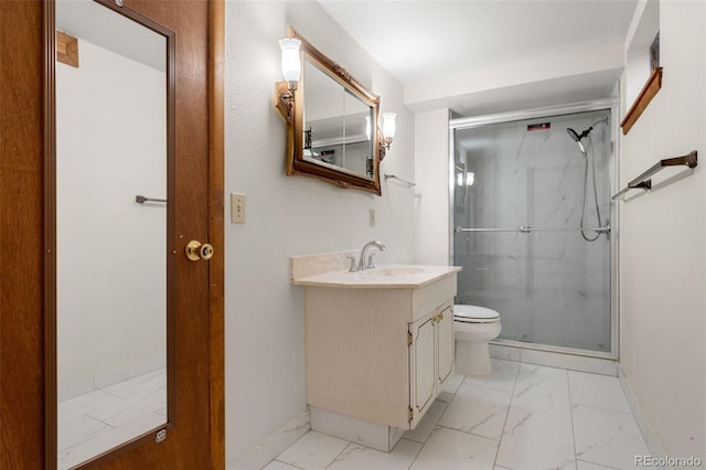 2696 S Yukon Ct, Lakewood, CO 80227 - bathroom featuring marble look tile flooring, vanity, and a stall shower
