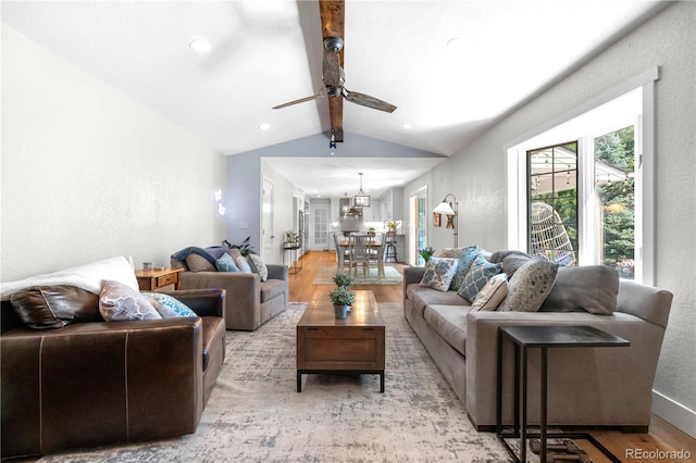 6795 E Kettle Ave, Centennial, CO 80112 - living room with wood finished floors, a ceiling fan, a textured wall, a chandelier, and recessed lighting