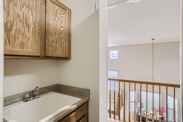 bathroom with sink and a bathing tub