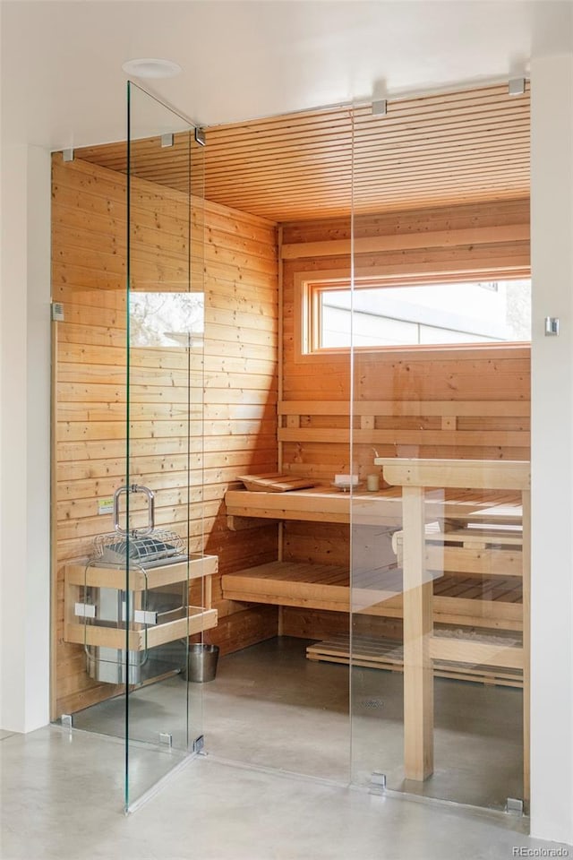 view of sauna with concrete flooring