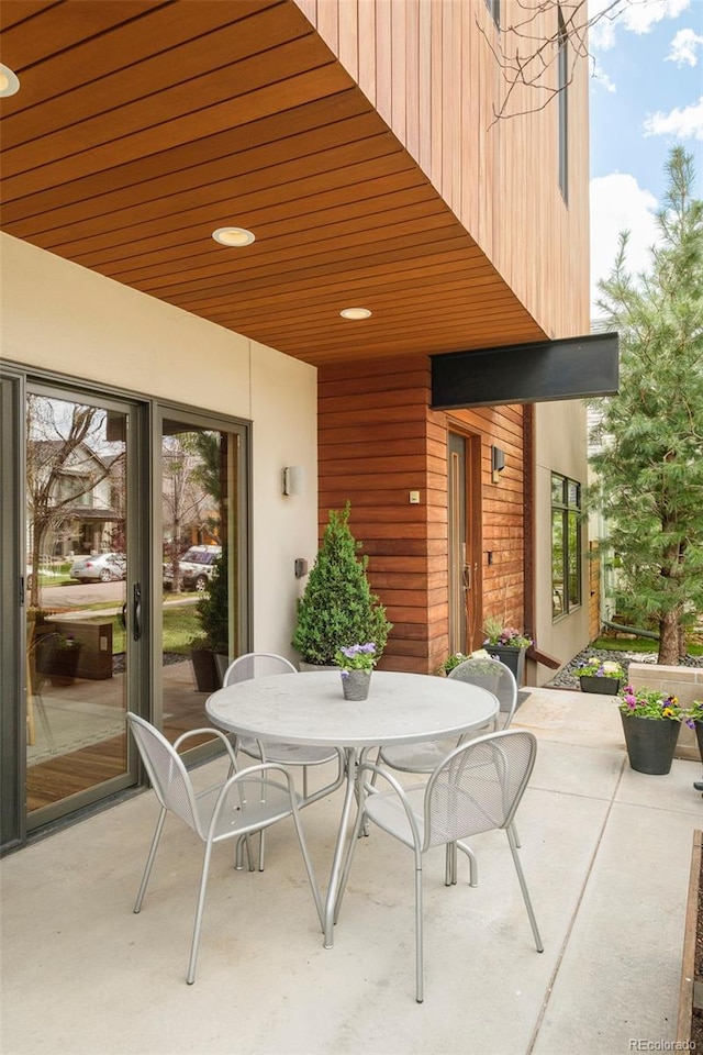 view of patio featuring outdoor dining space
