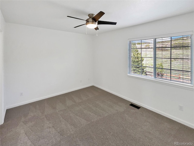 2180 Trailblazer Way, Castle Rock, CO 80109 - carpeted spare room with baseboards and ceiling fan