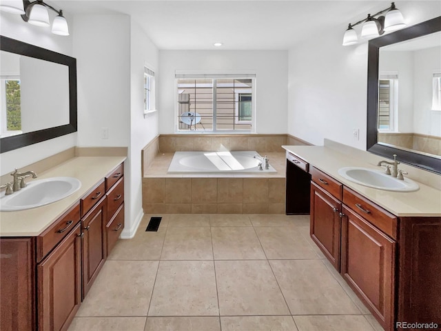 2180 Trailblazer Way, Castle Rock, CO 80109 - full bathroom featuring healthy amount of natural light, tile patterned flooring, two vanities, and recessed lighting