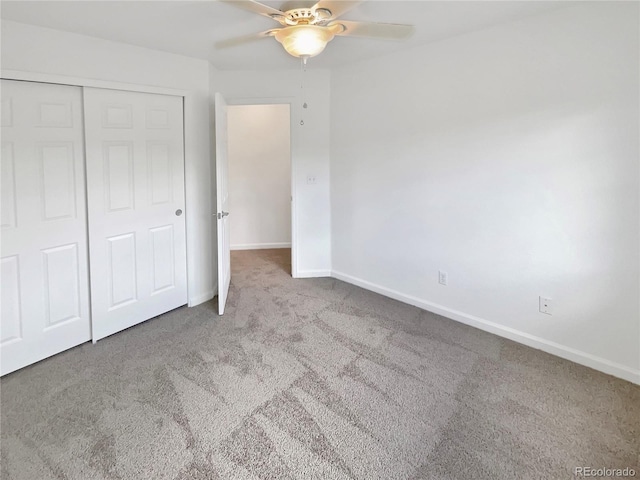 2180 Trailblazer Way, Castle Rock, CO 80109 - unfurnished bedroom with carpet floors, baseboards, a closet, and a ceiling fan