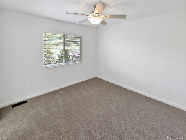 2180 Trailblazer Way, Castle Rock, CO 80109 - empty room with dark colored carpet, baseboards, and a ceiling fan