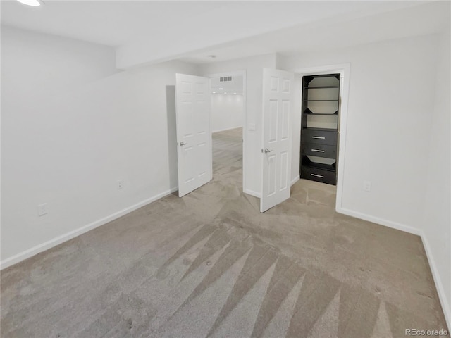 2180 Trailblazer Way, Castle Rock, CO 80109 - unfurnished bedroom with carpet, baseboards, a walk in closet, a closet, and recessed lighting