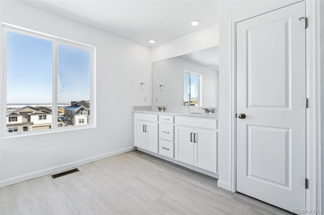 bathroom featuring vanity