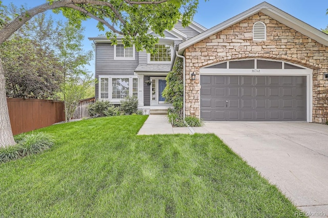 16341 Maple Rock Ct, Parker, CO 80134 - view of front of property featuring stone siding, concrete driveway, and an attached garage