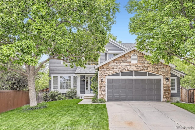 16341 Maple Rock Ct, Parker, CO 80134 - view of front of property with stone siding, an attached garage, and driveway