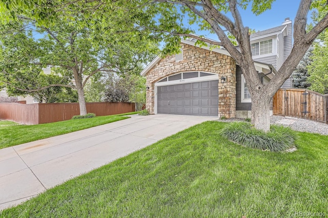 16341 Maple Rock Ct, Parker, CO 80134 - view of front of home with driveway, stone siding, and a garage